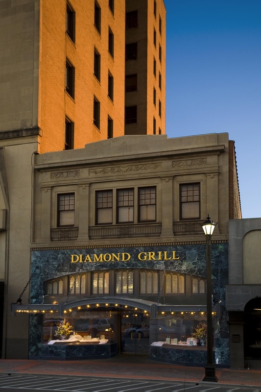 Diamond Grill historic storefront exterior with ornate facade and street lamp